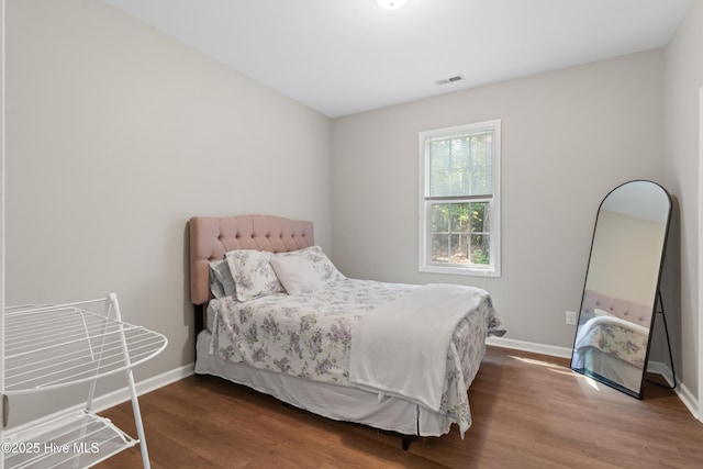 5709 Burgaw Hwy, Maple Hill, NC 28454 - bedroom with wood finished floors and baseboards