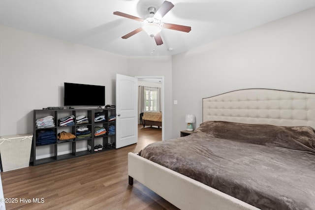 5709 Burgaw Hwy, Maple Hill, NC 28454 - bedroom featuring wood finished floors and a ceiling fan