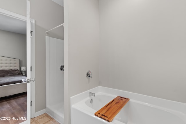 5709 Burgaw Hwy, Maple Hill, NC 28454 - bathroom featuring a bath, ensuite bathroom, and a shower