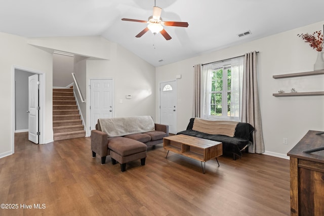 5709 Burgaw Hwy, Maple Hill, NC 28454 - living room featuring ceiling fan, wood finished floors, stairway, and vaulted ceiling