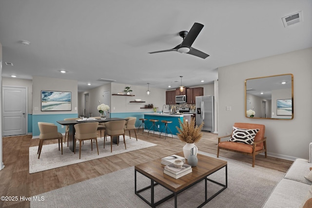 694 Chester Way NE, Leland, NC 28451 - living room featuring recessed lighting, light wood finished floors, and a ceiling fan