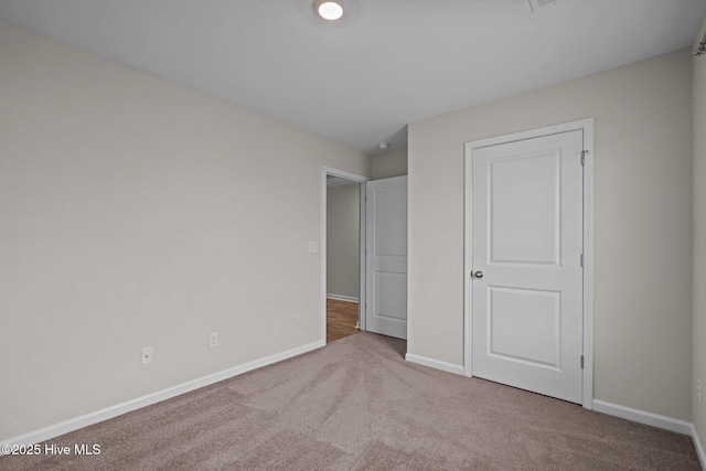 694 Chester Way NE, Leland, NC 28451 - unfurnished bedroom with carpet and baseboards