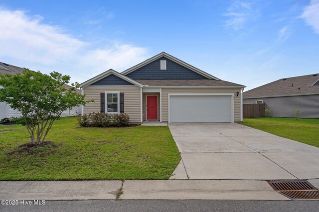 694 Chester Way NE, Leland, NC 28451 - view of front of home featuring concrete driveway and a garage