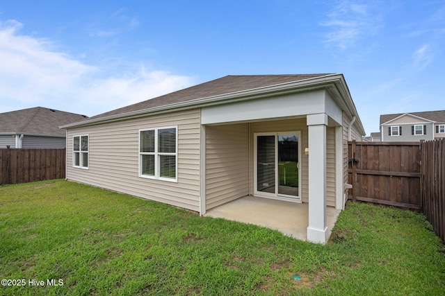 694 Chester Way NE, Leland, NC 28451 - rear view of property featuring a fenced backyard and a patio area
