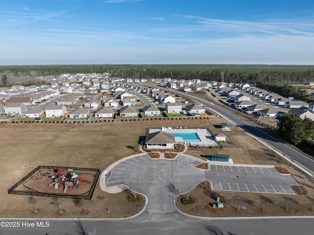 694 Chester Way NE, Leland, NC 28451 - view of property location with nearby suburban area and a pool