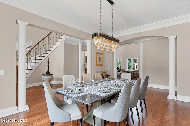 2270 Midland Rd, Pinehurst, NC 28374 - dining room with decorative columns, ornamental molding, wood finished floors, stairs, and arched walkways