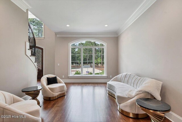 2270 Midland Rd, Pinehurst, NC 28374 - sitting room featuring plenty of natural light, ornamental molding, stairway, wood finished floors, and recessed lighting