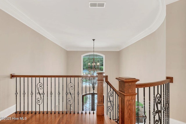 2270 Midland Rd, Pinehurst, NC 28374 - stairway with a chandelier, crown molding, and wood finished floors