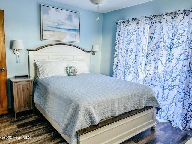 4704 S Va Dare Trl, Nags Head, NC 27959 - bedroom with dark wood finished floors