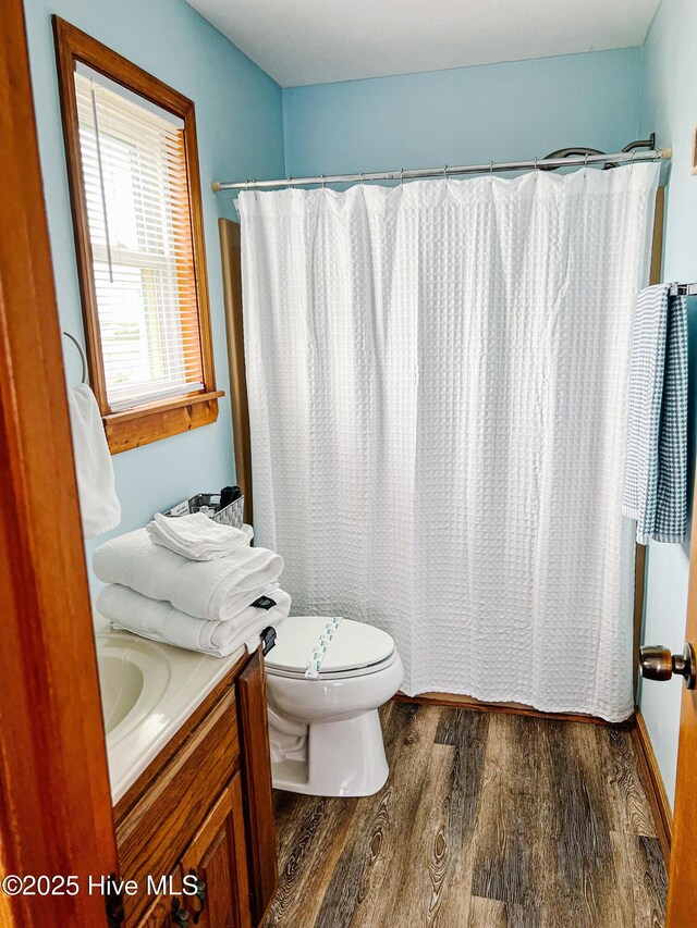 4704 S Va Dare Trl, Nags Head, NC 27959 - bathroom with wood finished floors, vanity, and curtained shower