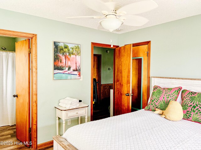 4704 S Va Dare Trl, Nags Head, NC 27959 - bedroom with wood finished floors and ceiling fan