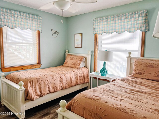 4704 S Va Dare Trl, Nags Head, NC 27959 - bedroom featuring dark wood finished floors and a ceiling fan