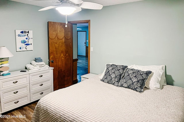 4704 S Va Dare Trl, Nags Head, NC 27959 - bedroom featuring dark wood-style floors and ceiling fan