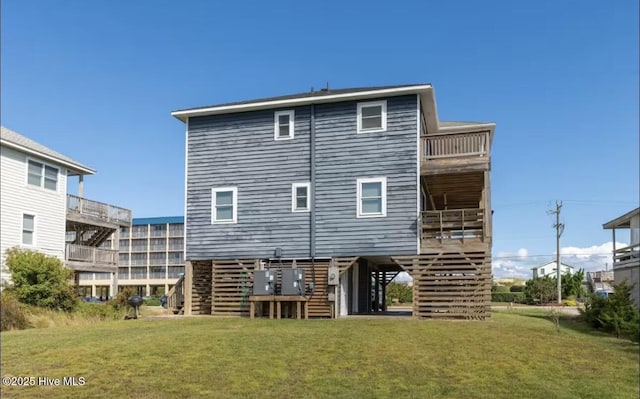 4704 S Va Dare Trl, Nags Head, NC 27959 - back of property featuring stairs, a yard, and a deck
