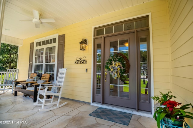 1209 Moultrie Dr NW, Calabash, NC 28467 - doorway to property featuring covered porch and ceiling fan