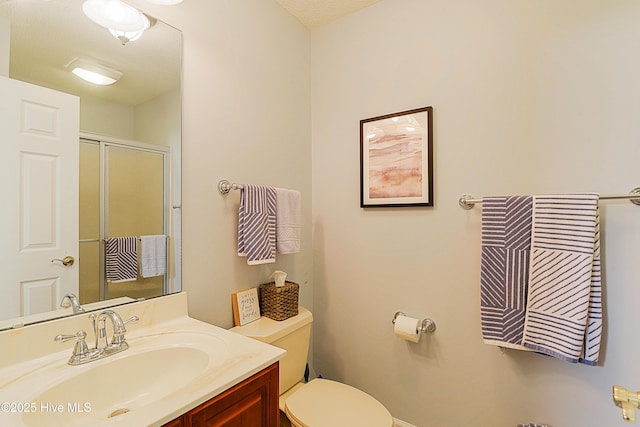 1209 Moultrie Dr NW, Calabash, NC 28467 - full bath featuring a stall shower, vanity, toilet, and baseboards