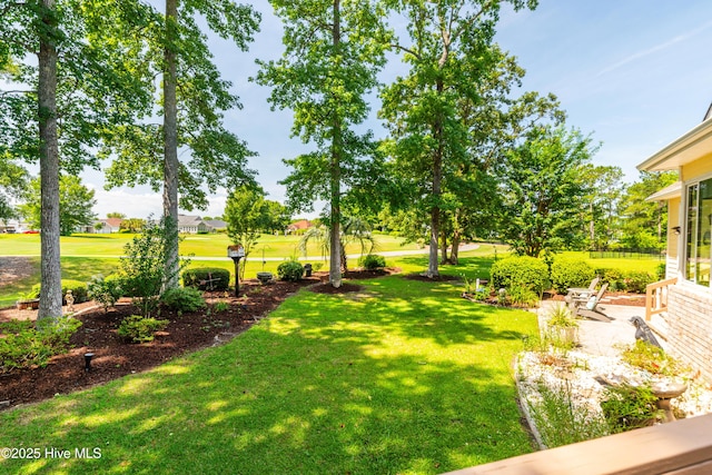1209 Moultrie Dr NW, Calabash, NC 28467 - view of green lawn featuring view of golf course