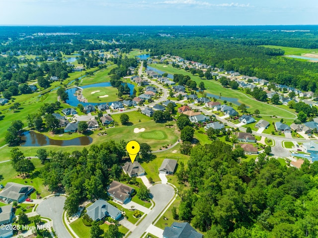 1209 Moultrie Dr NW, Calabash, NC 28467 - aerial view of residential area featuring a large body of water and a golf course