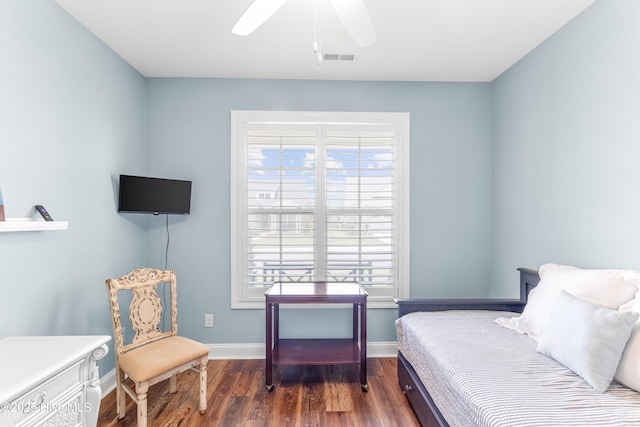 8116 Barstow Ln, Wilmington, NC 28411 - bedroom with multiple windows, dark wood finished floors, and a ceiling fan