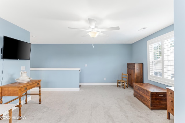8116 Barstow Ln, Wilmington, NC 28411 - living area with a ceiling fan and carpet flooring