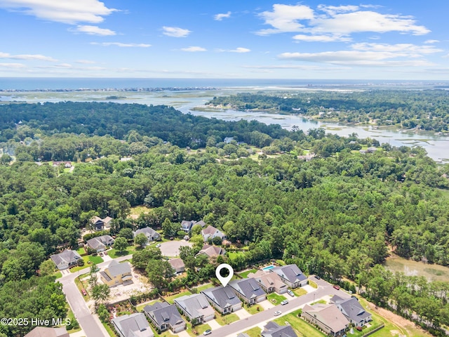 8116 Barstow Ln, Wilmington, NC 28411 - aerial perspective of suburban area featuring a nearby body of water and a heavily wooded area