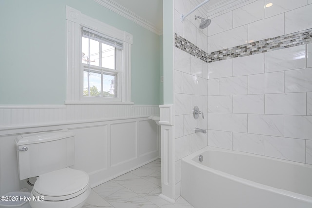 405 Hancock St, New Bern, NC 28560 - full bath with marble look tiles, ornamental molding, toilet, a wainscoted wall, and shower / bathtub combination