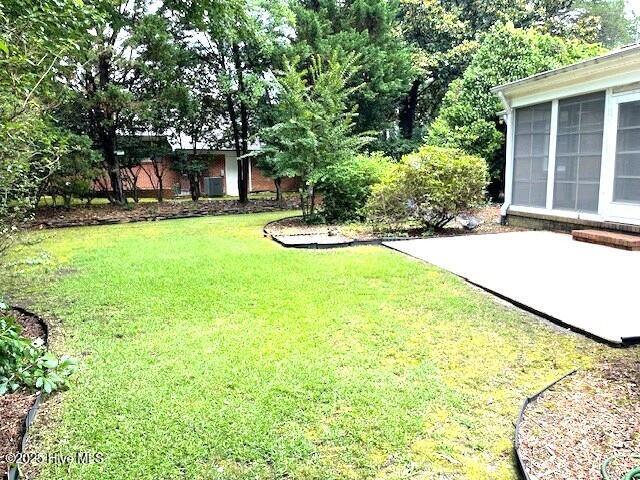 105 Ridgewood Rd, Pinehurst, NC 28374 - view of grassy yard with a patio area