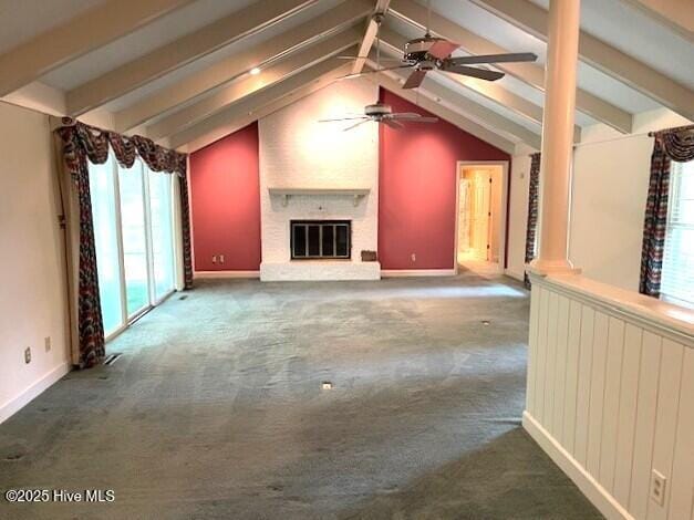 105 Ridgewood Rd, Pinehurst, NC 28374 - unfurnished living room featuring healthy amount of natural light, ceiling fan, carpet flooring, and a fireplace