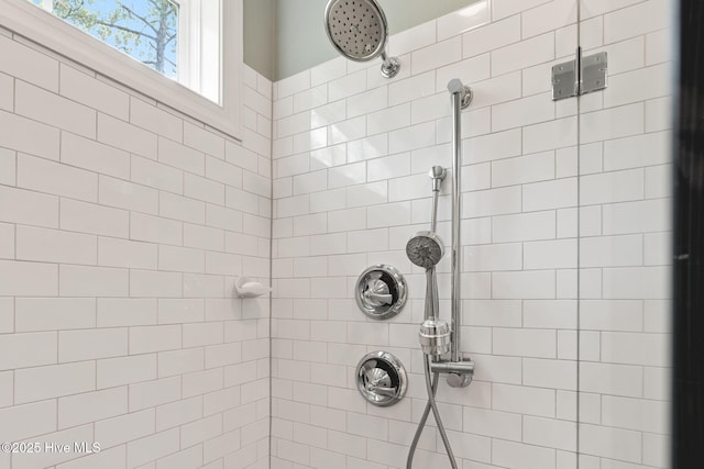 322 NE 42nd St, Oak Island, NC 28465 - bathroom featuring tiled shower