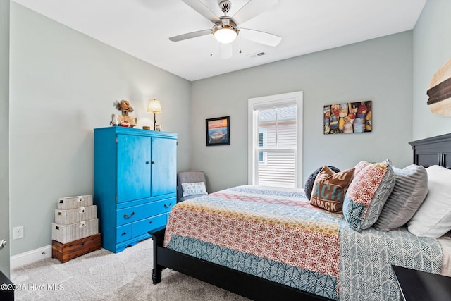 322 NE 42nd St, Oak Island, NC 28465 - bedroom featuring light carpet and ceiling fan