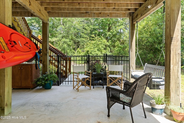 322 NE 42nd St, Oak Island, NC 28465 - view of patio / terrace featuring stairway