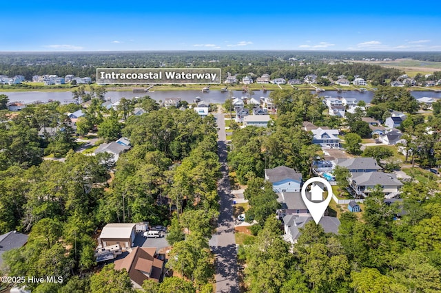 322 NE 42nd St, Oak Island, NC 28465 - aerial view of residential area with a nearby body of water