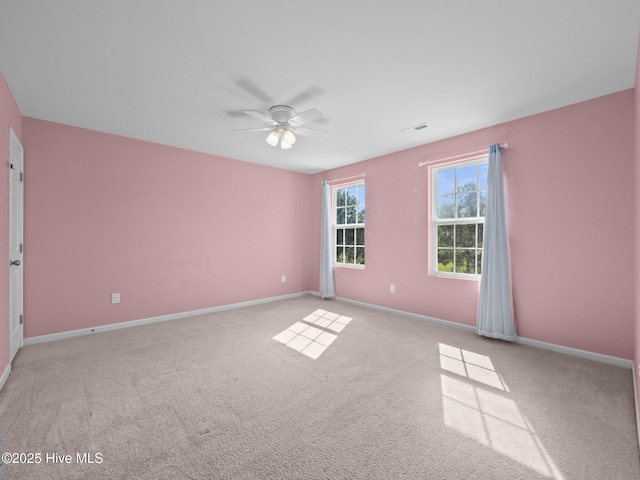 301 Stella Bridgeway Dr, Stella, NC 28582 - carpeted empty room featuring a ceiling fan and baseboards