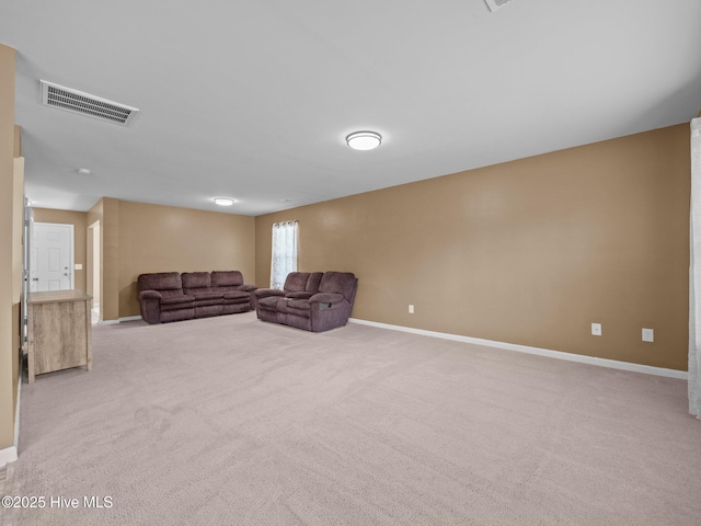 301 Stella Bridgeway Dr, Stella, NC 28582 - unfurnished living room with baseboards and light colored carpet