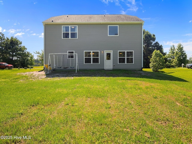 301 Stella Bridgeway Dr, Stella, NC 28582 - back of property with a lawn