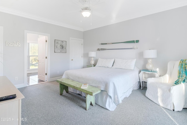 2911 E Pelican Dr, Oak Island, NC 28465 - carpeted bedroom with crown molding and ceiling fan