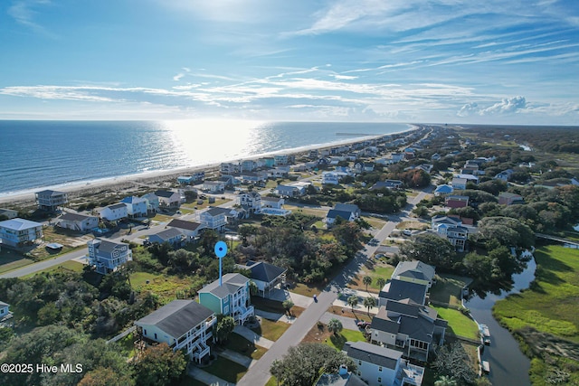 2911 E Pelican Dr, Oak Island, NC 28465 - bird's eye view of waterfront with a beach