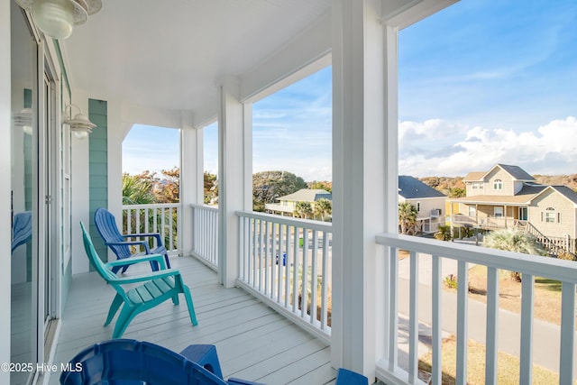 2911 E Pelican Dr, Oak Island, NC 28465 - balcony featuring a residential view