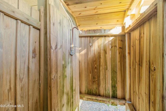 2911 E Pelican Dr, Oak Island, NC 28465 - exterior view of wooden walls