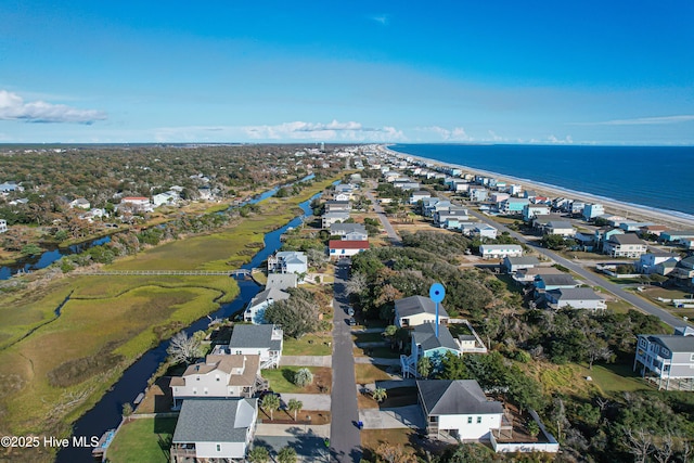 2911 E Pelican Dr, Oak Island, NC 28465 - aerial view of residential area featuring a nearby body of water