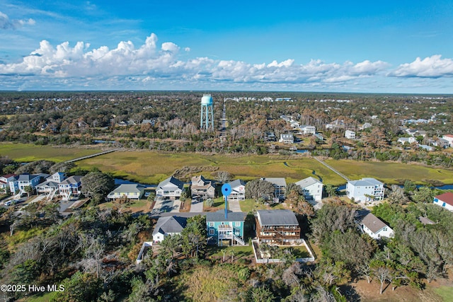 2911 E Pelican Dr, Oak Island, NC 28465 - aerial view of property and surrounding area featuring nearby suburban area