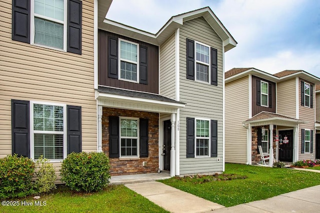108 Meadow Way, Havelock, NC 28532 - view of front of house with a front lawn and stone siding