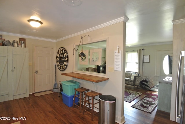 1307 Hunters Rd, New Bern, NC 28562 - entryway featuring dark wood finished floors and crown molding