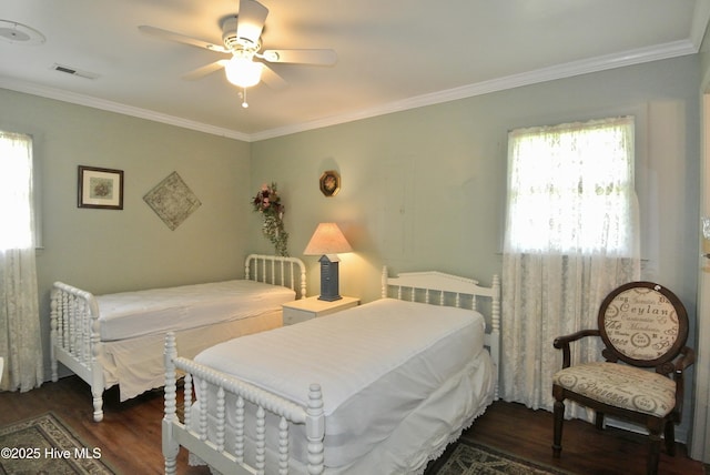 1307 Hunters Rd, New Bern, NC 28562 - bedroom with wood finished floors, ornamental molding, multiple windows, and a ceiling fan