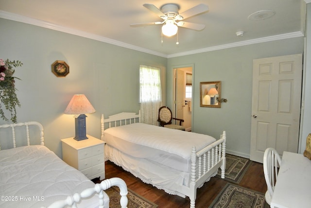 1307 Hunters Rd, New Bern, NC 28562 - bedroom with dark wood-style flooring, crown molding, and a ceiling fan
