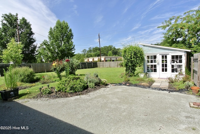 1307 Hunters Rd, New Bern, NC 28562 - fenced backyard featuring a patio and french doors