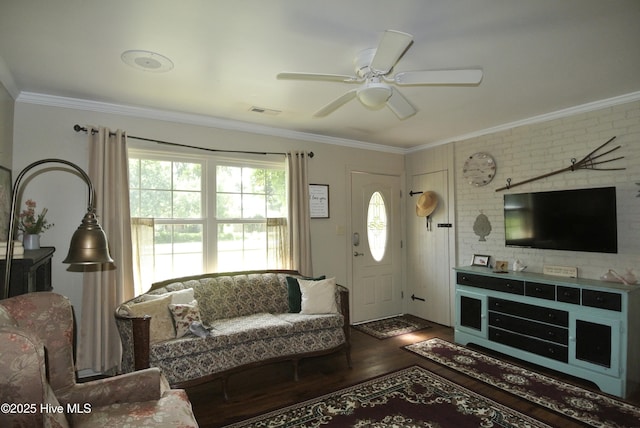 1307 Hunters Rd, New Bern, NC 28562 - living room with wood finished floors, ornamental molding, a ceiling fan, and brick wall