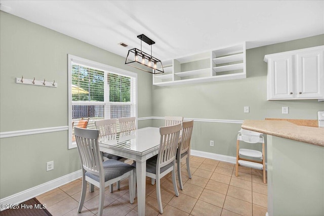 1009 Stonesthrow Ct, Leland, NC 28451 - dining room with baseboards and light tile patterned floors