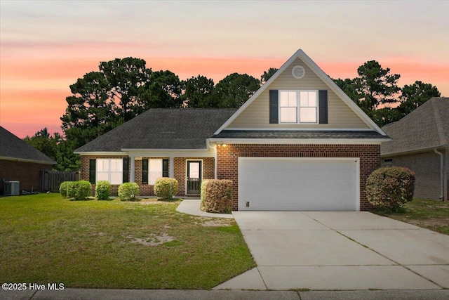 1009 Stonesthrow Ct, Leland, NC 28451 - traditional home featuring brick siding, driveway, and a garage