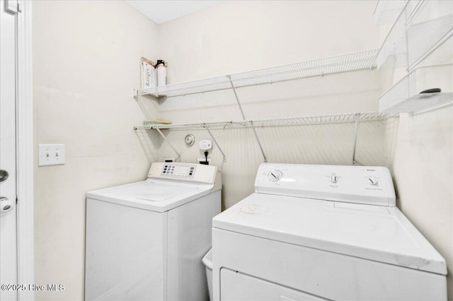 1009 Stonesthrow Ct, Leland, NC 28451 - washroom featuring washing machine and clothes dryer
